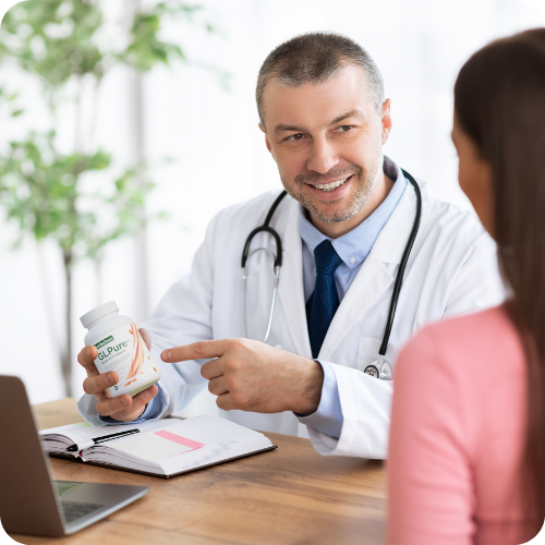 Doctor recommending GLPure supplement to a patient during a consultation for improved health.