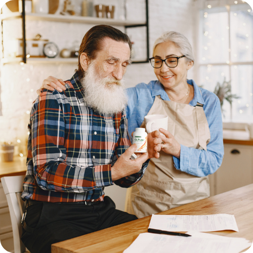 Elderly couple looking at GLPure supplement with a sense of understanding